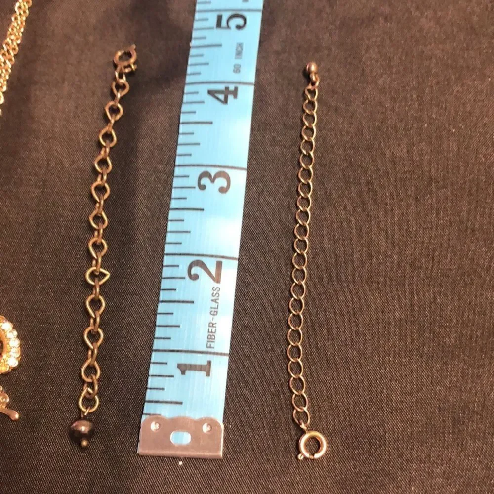 Gold tone jewelry collection w/2 necklace extenders